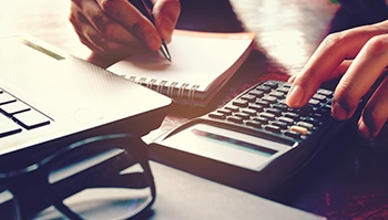 Woman using a calculator