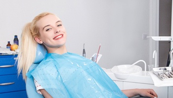 Woman smiling in dental chair after nitrous oxide in Brick Township, NJ